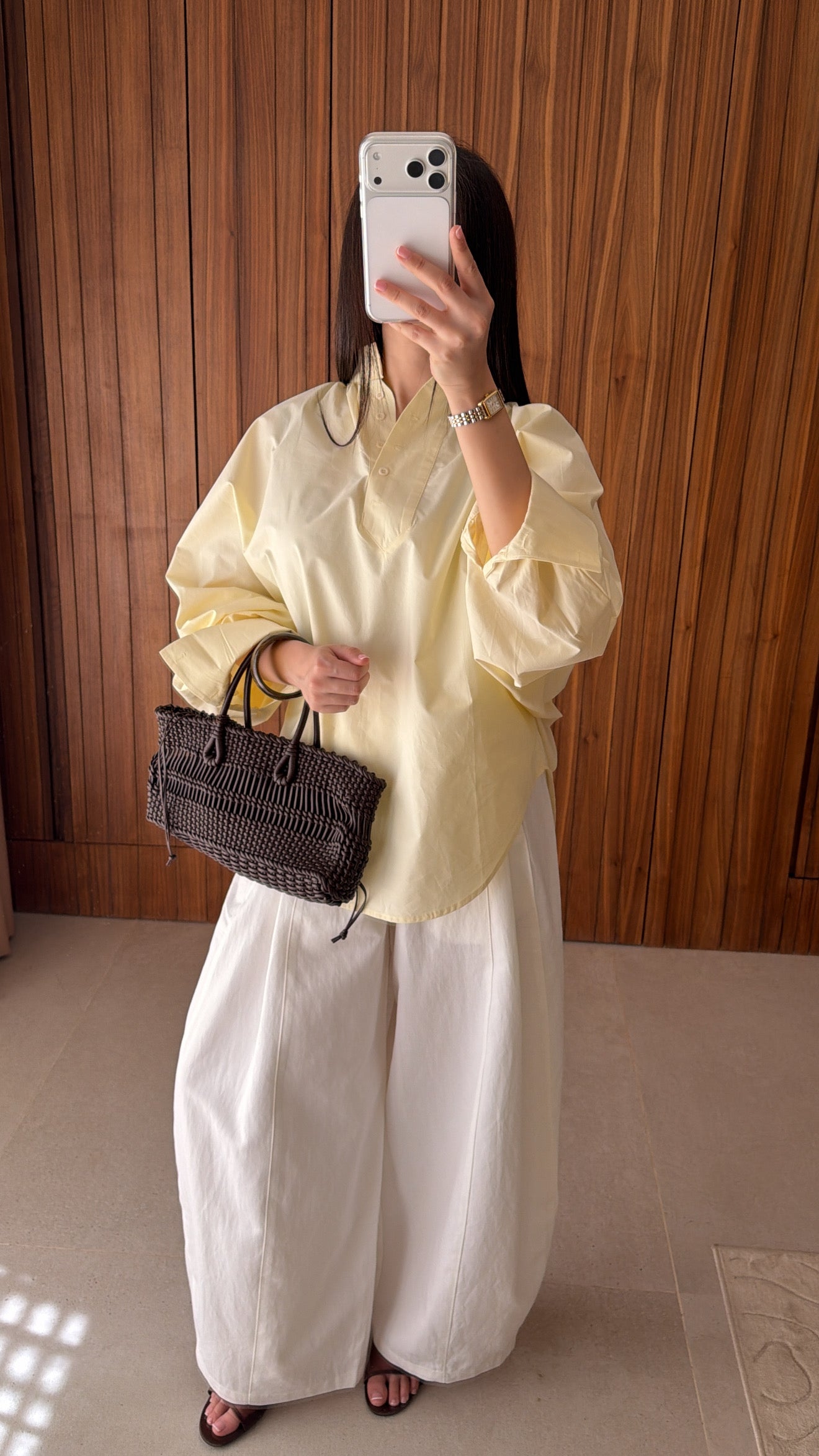 White flared trousers with belt