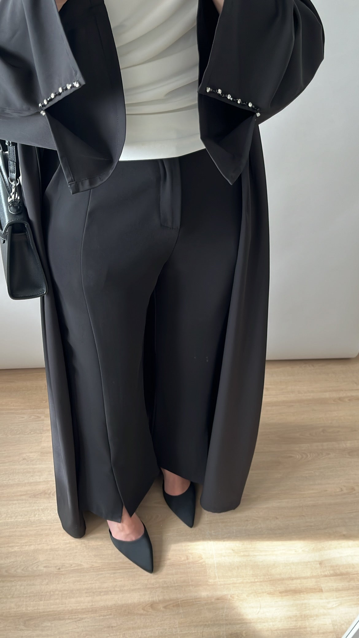 Black kimono with slits on the sleeves