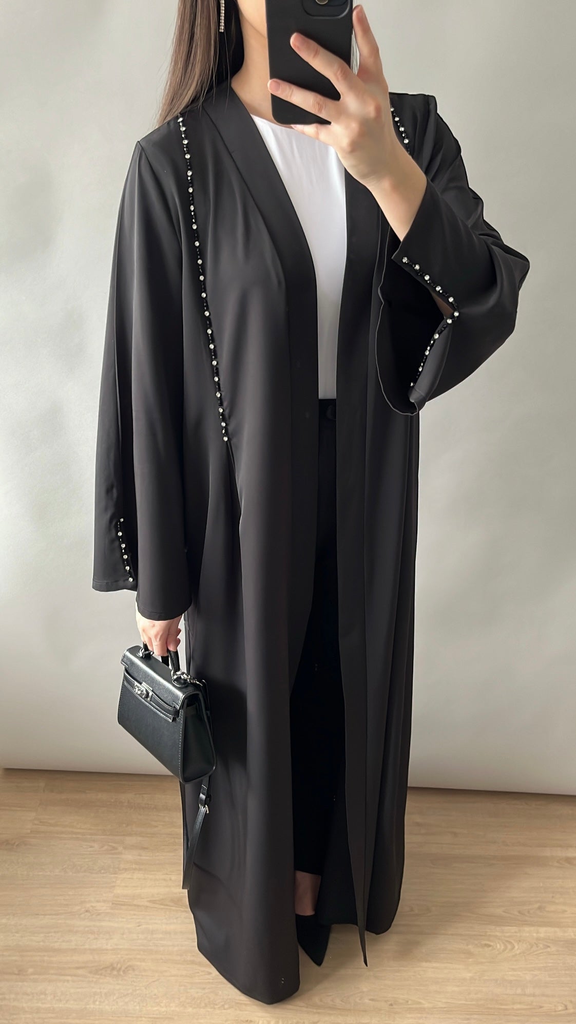 Black kimono with slits on the sleeves