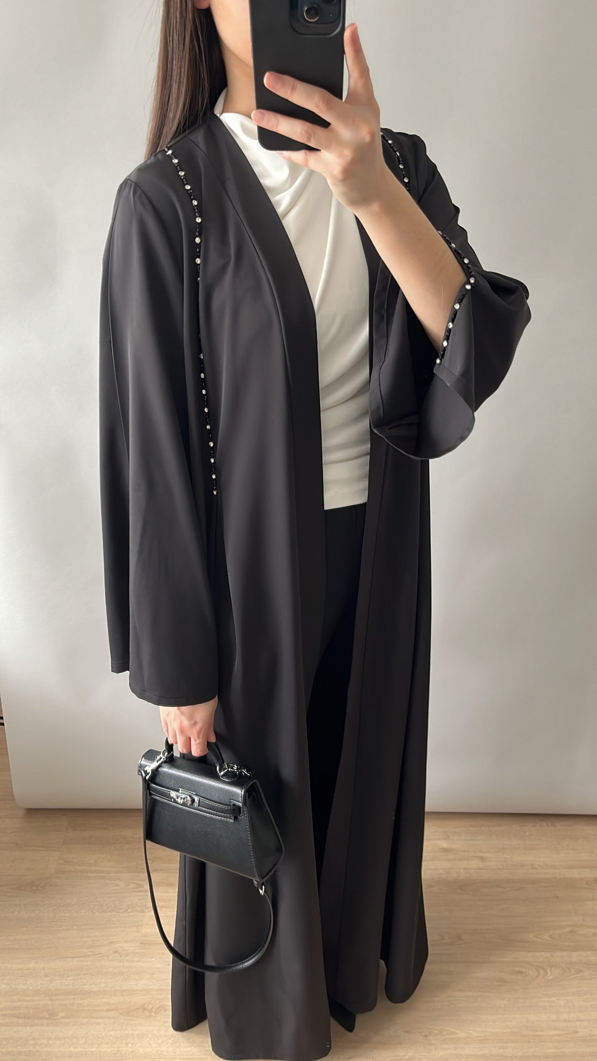 Black kimono with slits on the sleeves