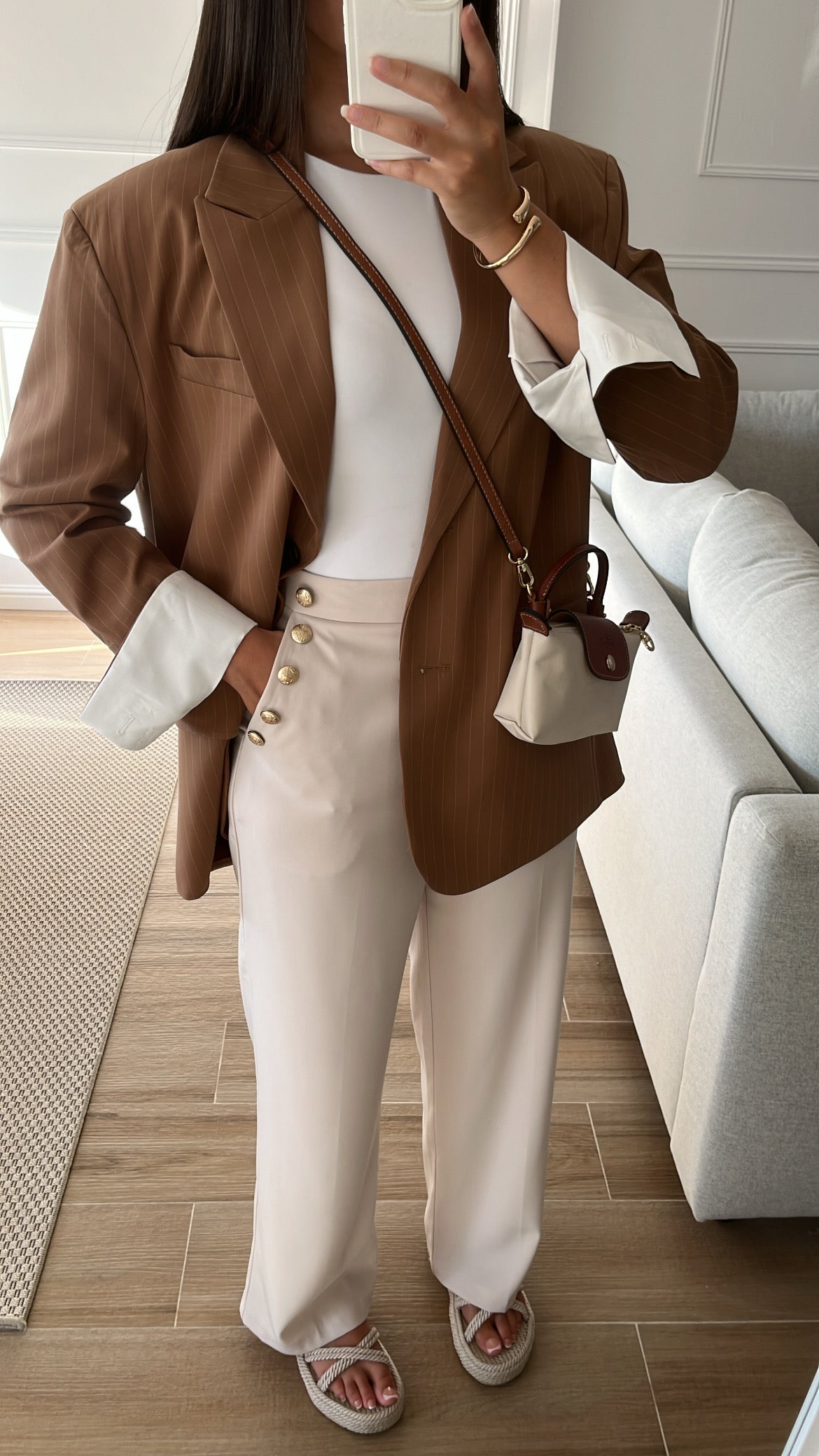 Beige pants with gold button