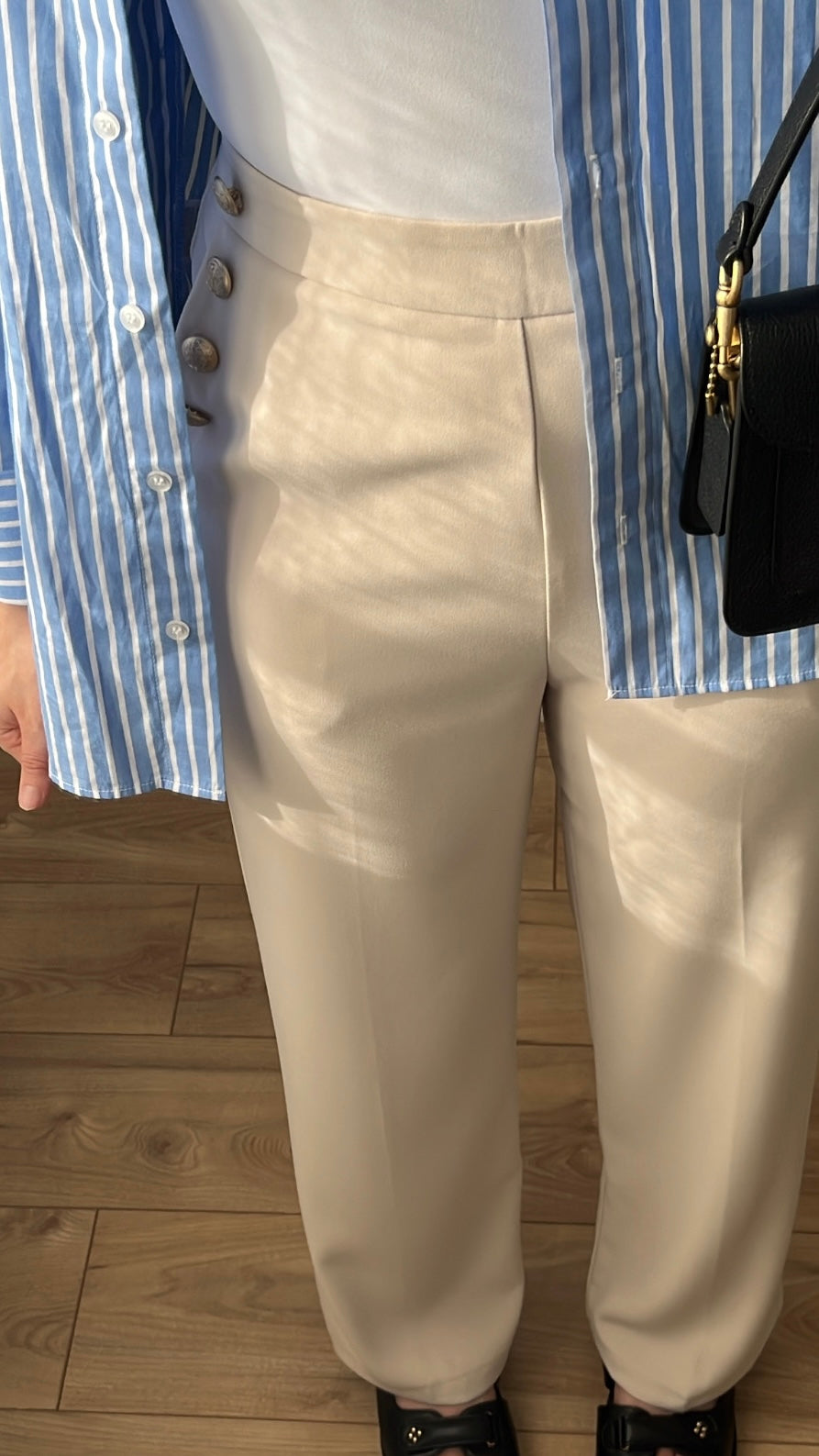 Beige pants with gold button