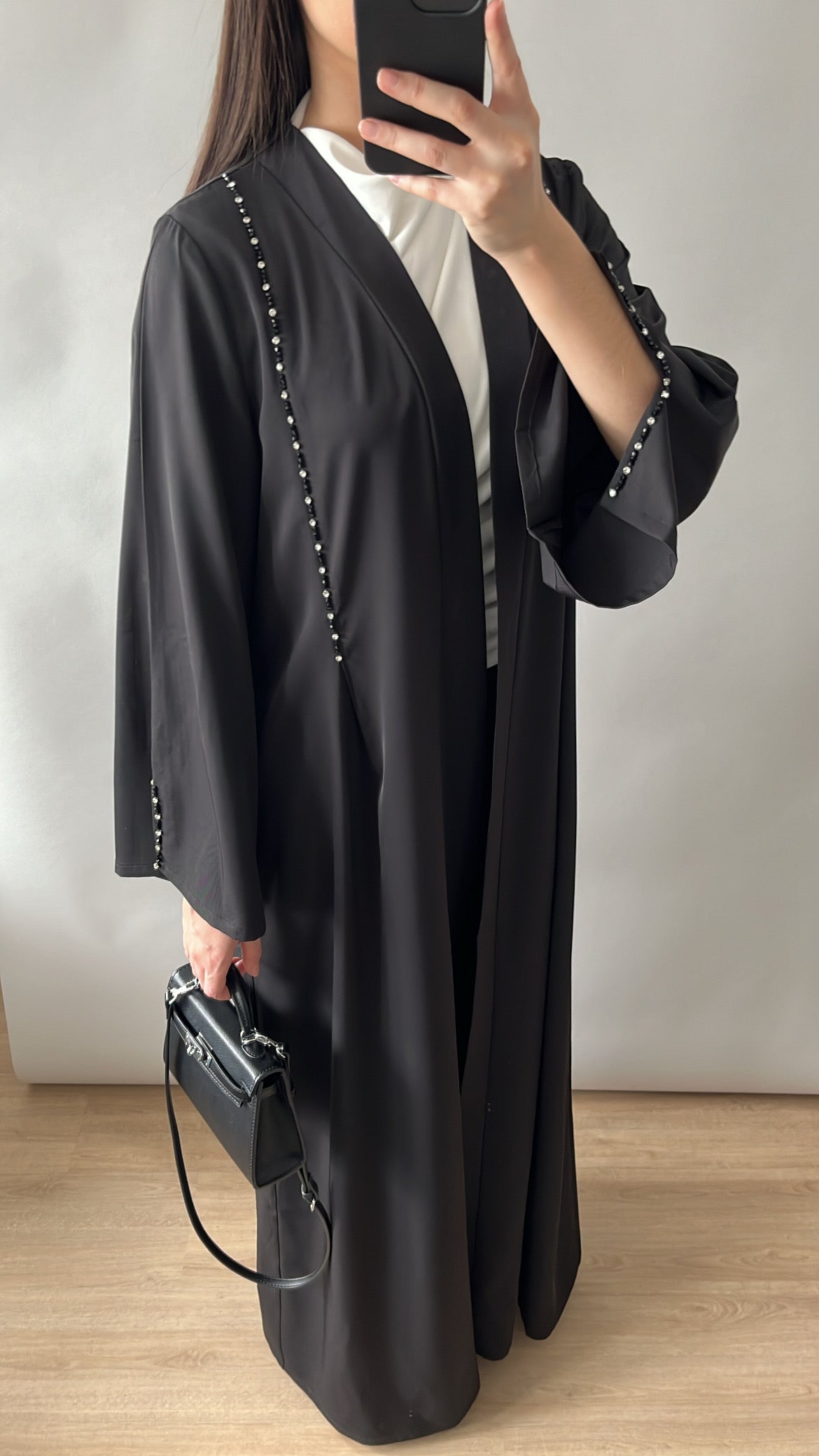 Black kimono with slits on the sleeves